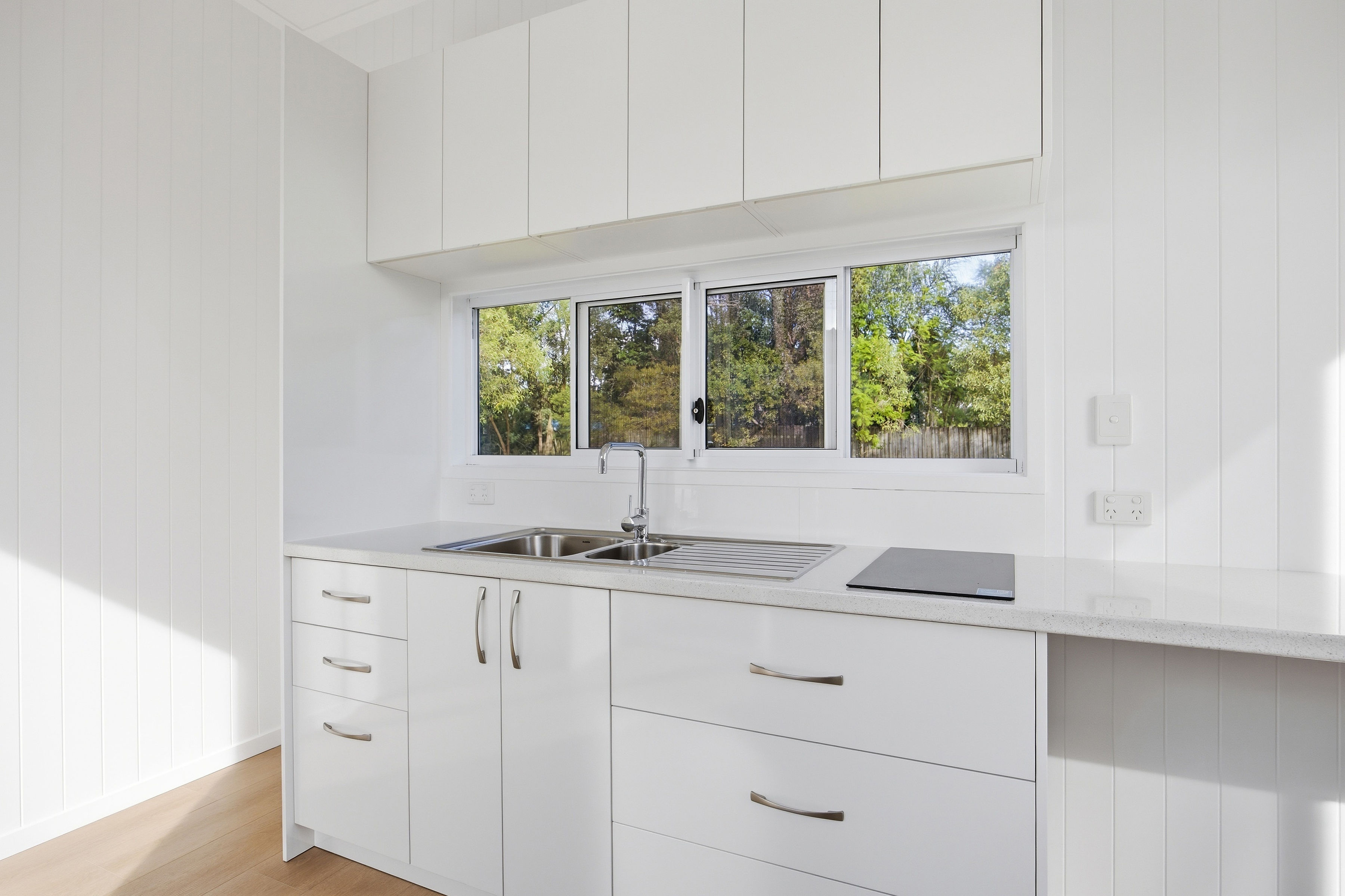 Magpie 9 kitchen and living space with bright windows